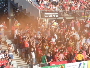 Naughty little Adelaide Utd fans set off a flare during the game against the Melbourne Victory